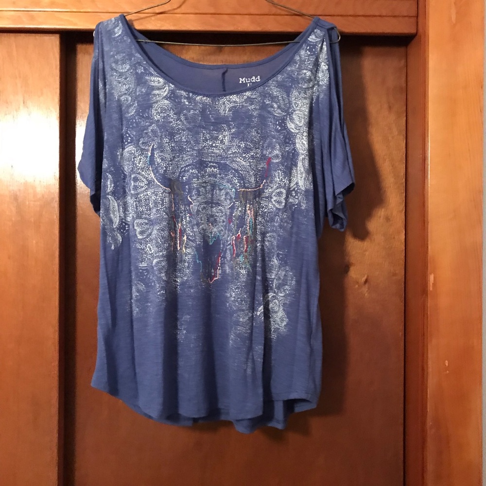 Cow skull printed shirt.